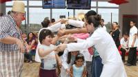 kids and staff playing at a hospital event